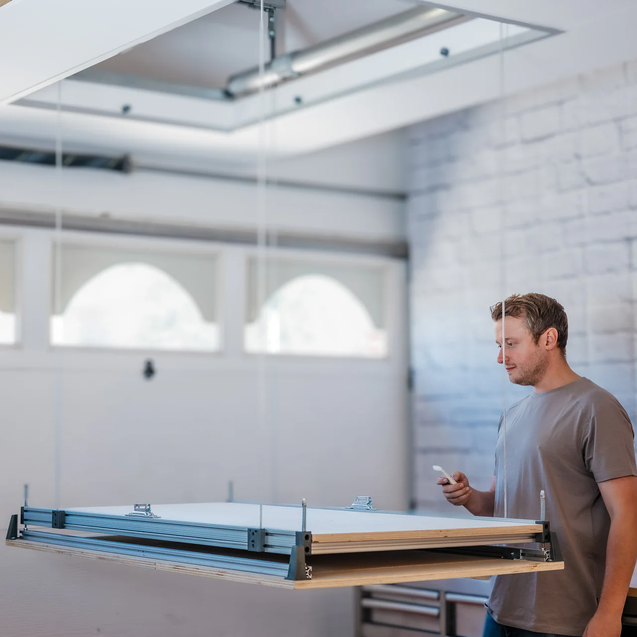 RemoteControlledAtticLiftByAuxxLiftimg1